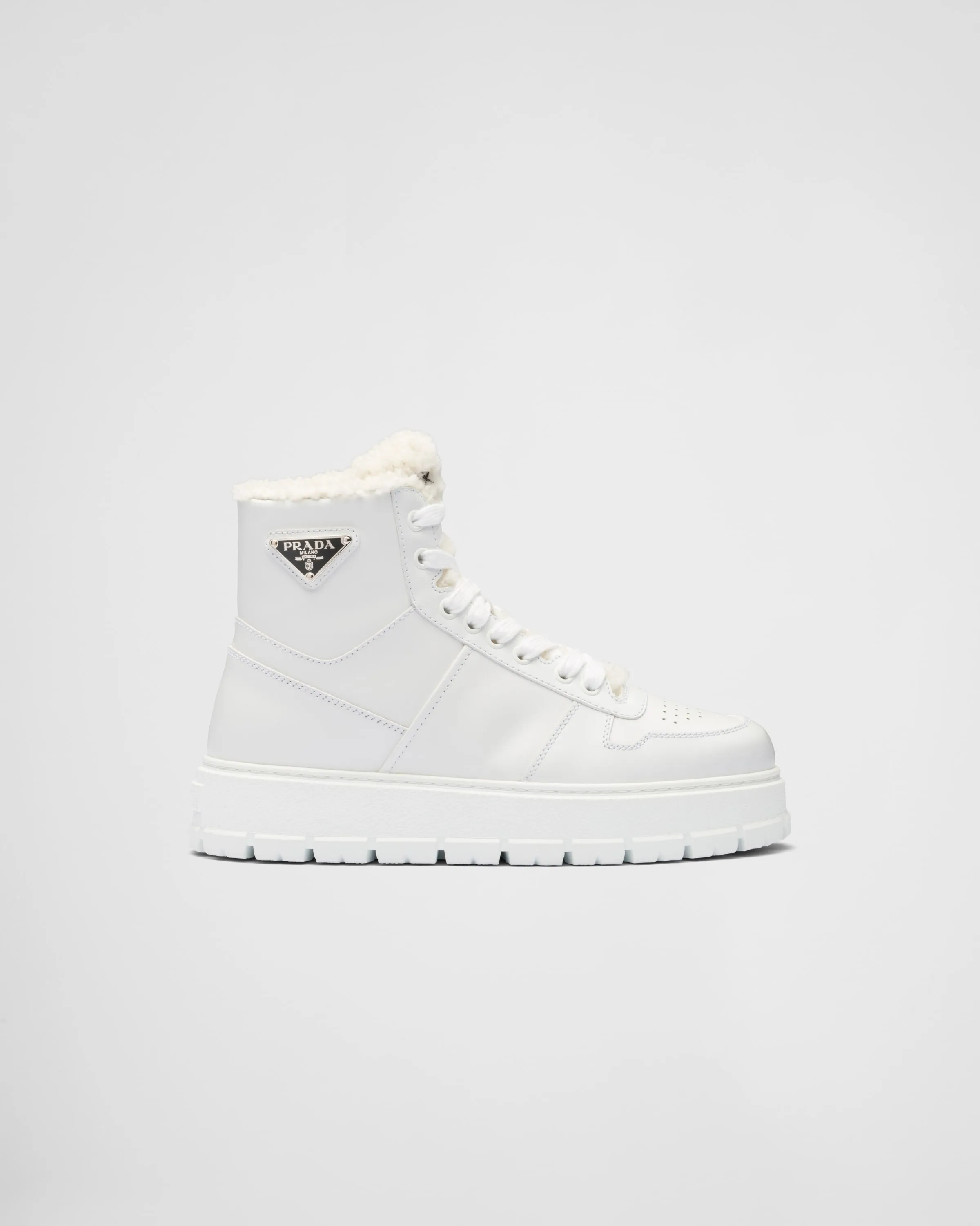 Leather and shearling high-top sneakers