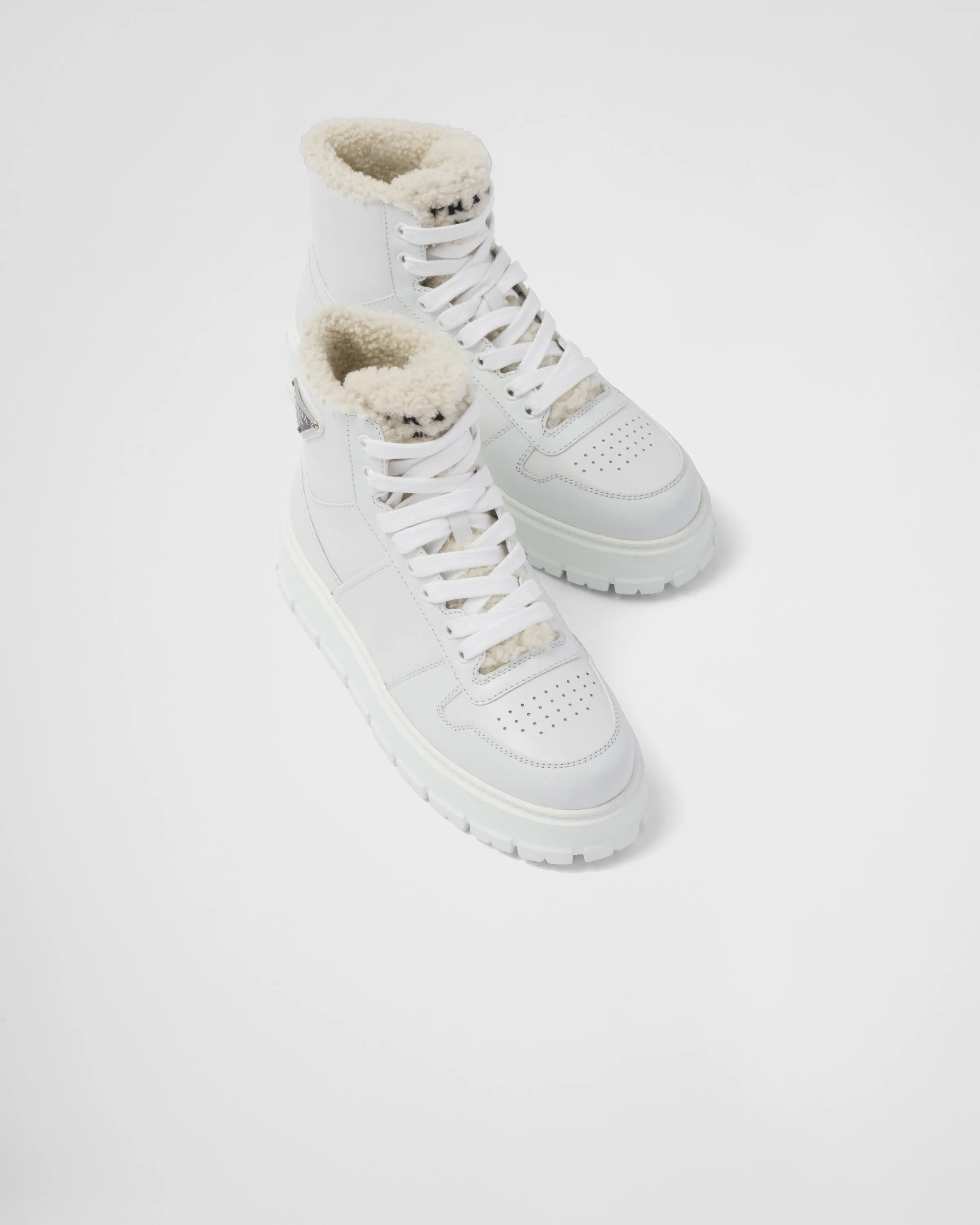 Leather and shearling high-top sneakers